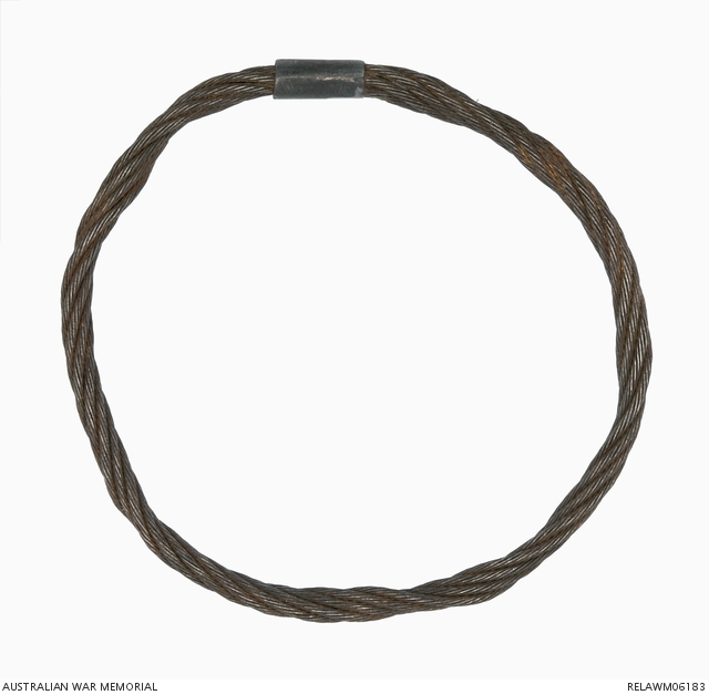 Bangle made from the wire from a Schutte-Lanz type German airship SL11. The ends have been joined together by a small cylindrical piece of metal.