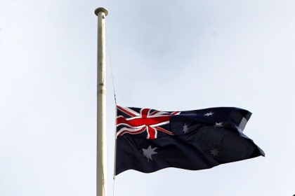 The Australian flag at half mast