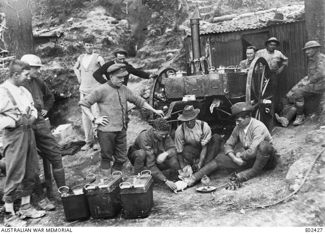 Men of the 27th Battalion with their "souvenired" pets.