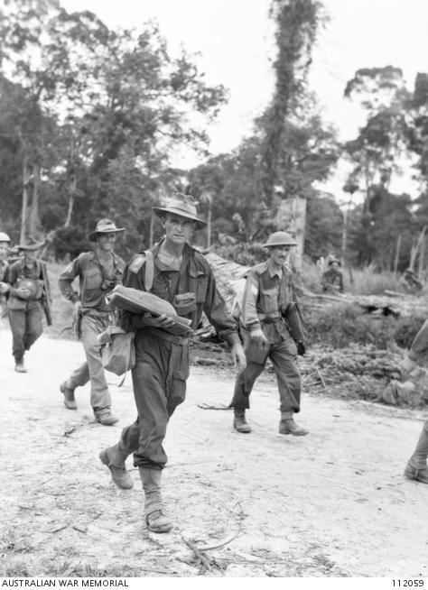 Lieutenant Colonel Murray Robson leads members of the 2/31st Battalion during the Balikpapan campaign