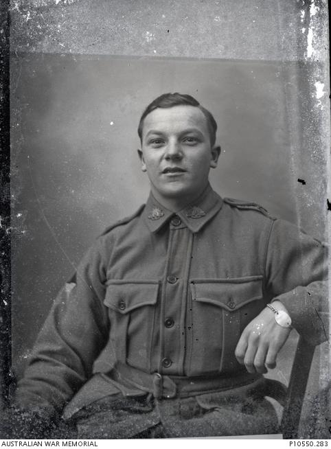 Portrait of an unidentified Australian soldier from the 2nd Division taken by Louis and Antoinette Thuillier in Vignacourt, France. He wears an identity bracelet on his left wrist. 