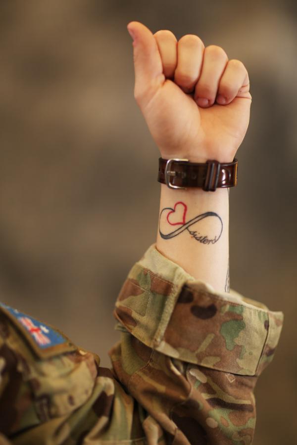 LCpl Tamara Jesenkovic's tattoo. Her sister has the same design on her ankle. They had the tattoos done together before Tamara deployed to Afghanistan.  Photo by G1.