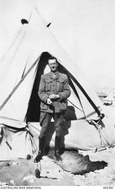 Charles Bean outside his tent in the AIF camp at Mena, Egypt, 1915.