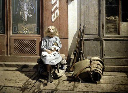 A small girl playing with her doll, Reims, 1917