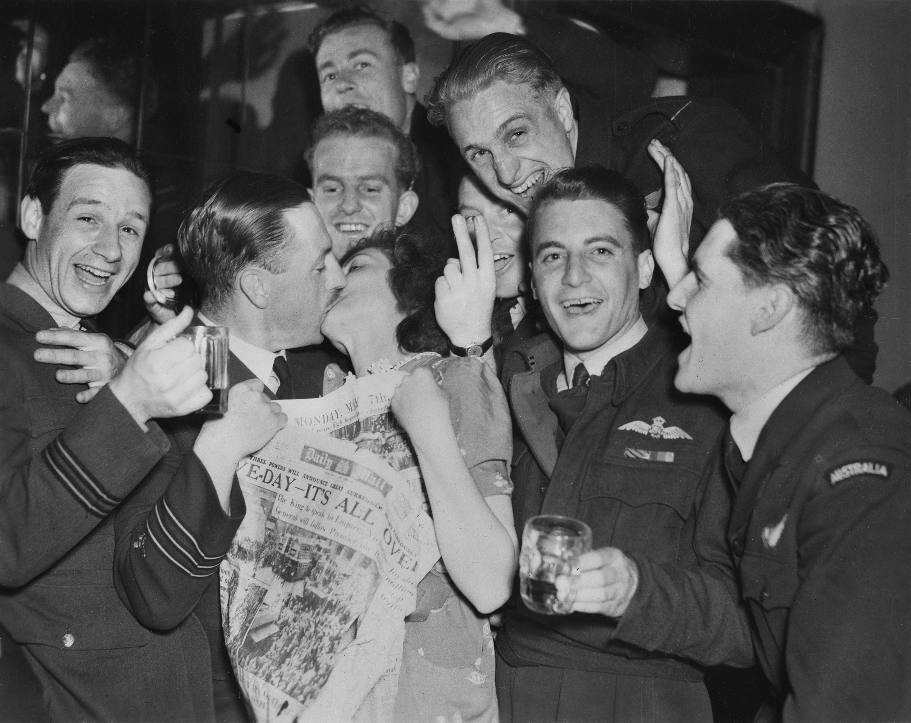 RAAF crew members celebrate a belated VE day in their station mess