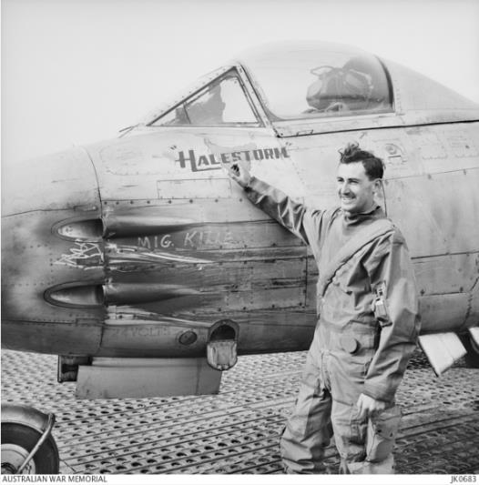 Sergeant George Hale with his Meteor Mk 8 after a brush with MiG-15s over North Korea in March 1953. Hale scored several hits and is credited with one MiG probably destroyed and another damaged. AWM JK0683