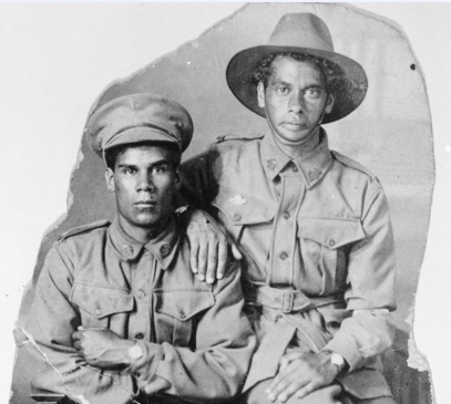 Studio portrait of two Aboriginal servicemen from Taree, NSW; 6564 Private William "Nip" Simon (left) and 6551 Private Harold Howard Maher