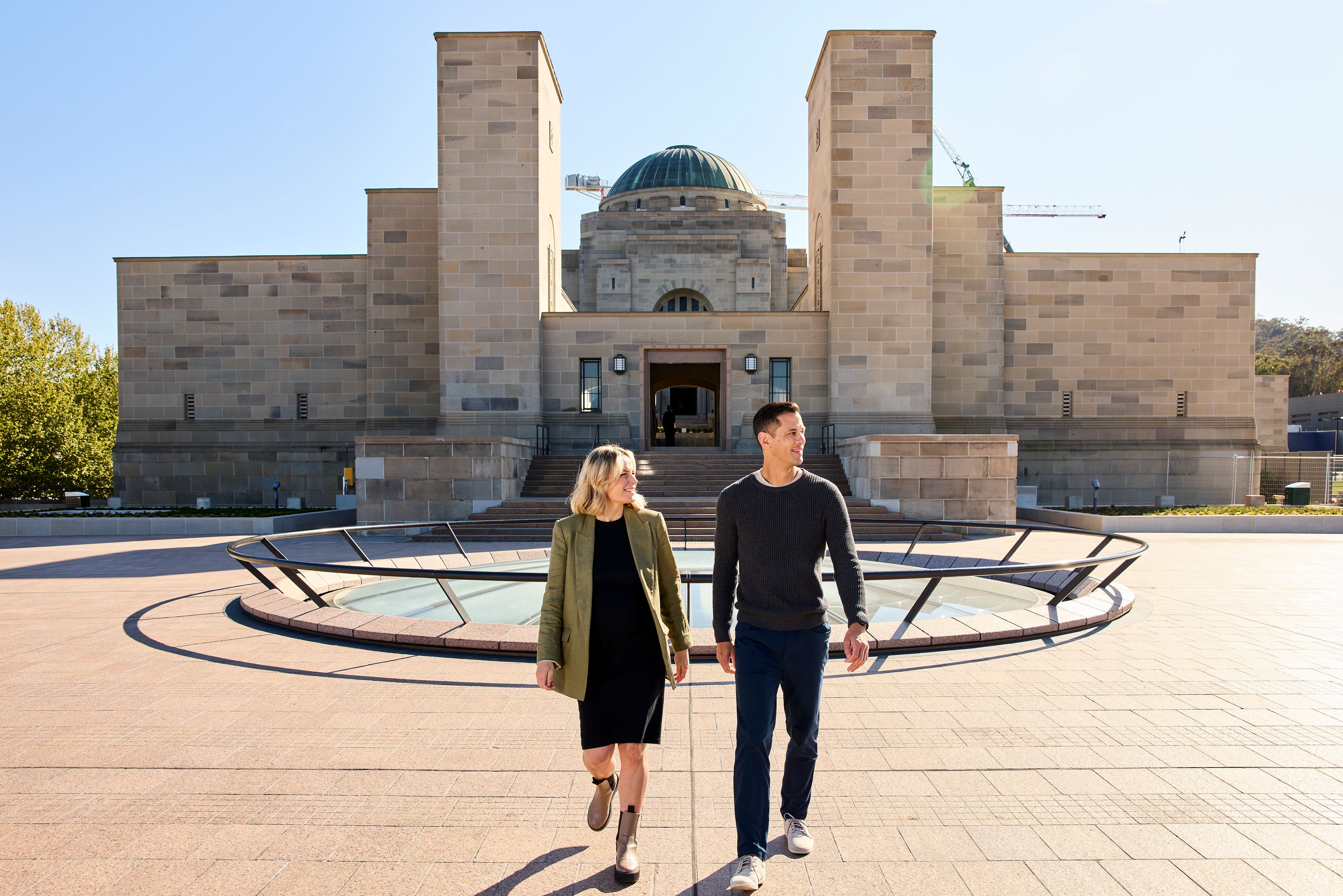 Visitors outside the Commemorative Entrance, on the Forecourt