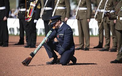 Didgeridoo being played by Navy Officer at Anzac Day service in 2019