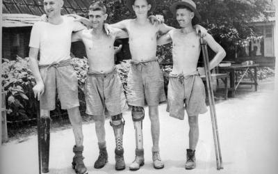 Men at Changi Prison Camp wearing artificial limbs made in Purdon’s factory