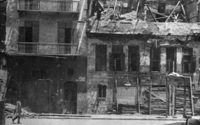 The facade of burnt out buildings after the Good Friday riot.