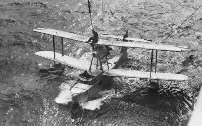 A Supermarine Walrus (also known as the Seagull V) amphibious biplane being taxied by John Napier Bell in 1939.