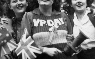 Miss Lois Martin was captured celebrating the end of the war on a Melbourne street by a roving photographer. She stood out among the crowd with her handmade vest and painted face.