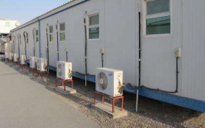 Prefab buildings with air con units attached