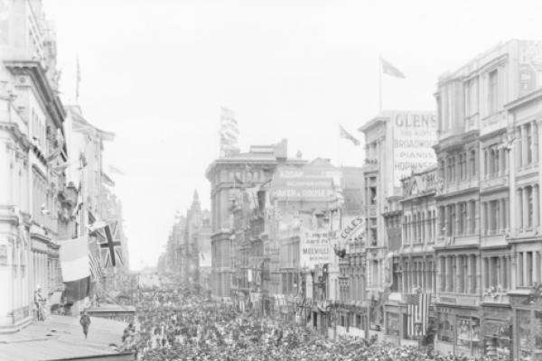 Crowd fill the city streets on Armistice Day in Melbourne.