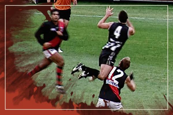 AFL players during past Anzac Day match