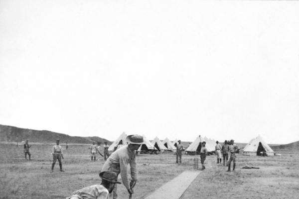 Australian troops play a game of cricket in South Africa during the Boer War. 