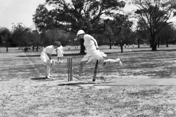 Lieutenant Colonel Kathleen Best of the Australian Army Medical Women’s Service at the crease in South Yarra, January 1944. Corporal J. Scott keeps wicket.