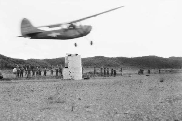 Korean War: Pilots of light liaison aircraft serving with Australian and other Commonwealth troops in Korea celebrated anniversary the Battle of Britain by playing an aerial cricket match against American Army pilots. Note the wickets with bails beneath the aircraft.