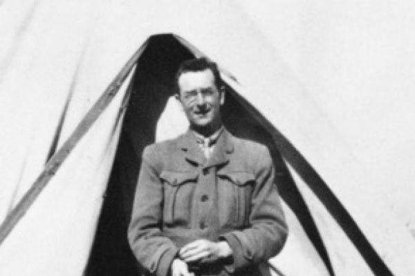 Charles Bean in front of his tent
