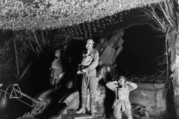 Soldiers wearing their gas respirators