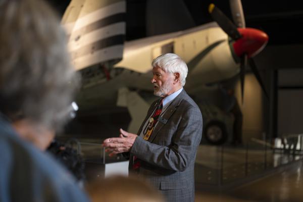 Volunteer guide in aircraft hall