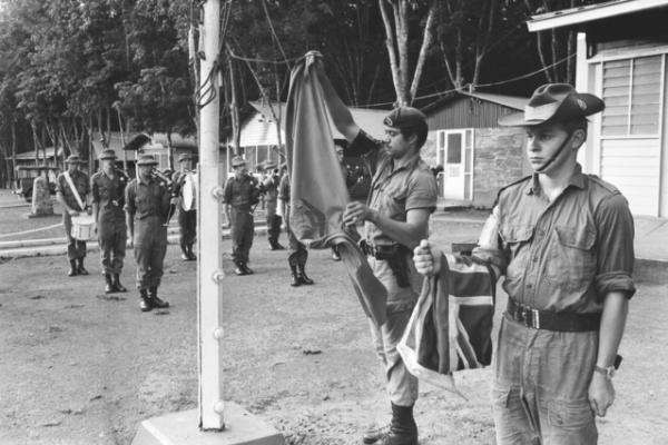 Flag lowering ceremony as the last Australian and New Zealand troops leave Nui Dat, 7 November 1971