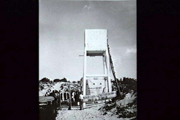 Water tank and pump house of a water reticulation system built by Australians and the US under the Civil Aid Program