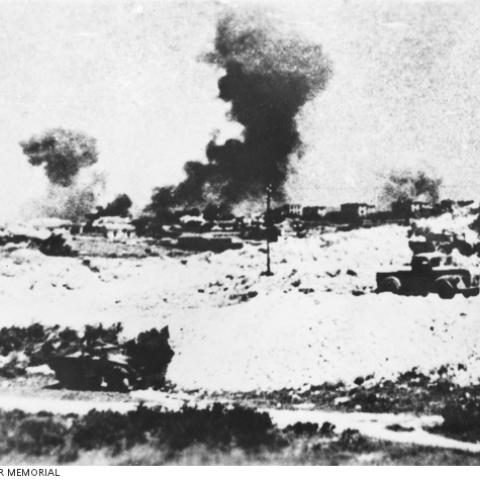 The town of Heraklion on the north coast of Crete, being bombed by the German Luftwaffe during the German airborne invasion of the island. 
