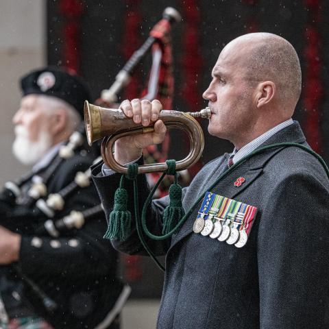 Bugler sounding the last post at the Australian War Memorial