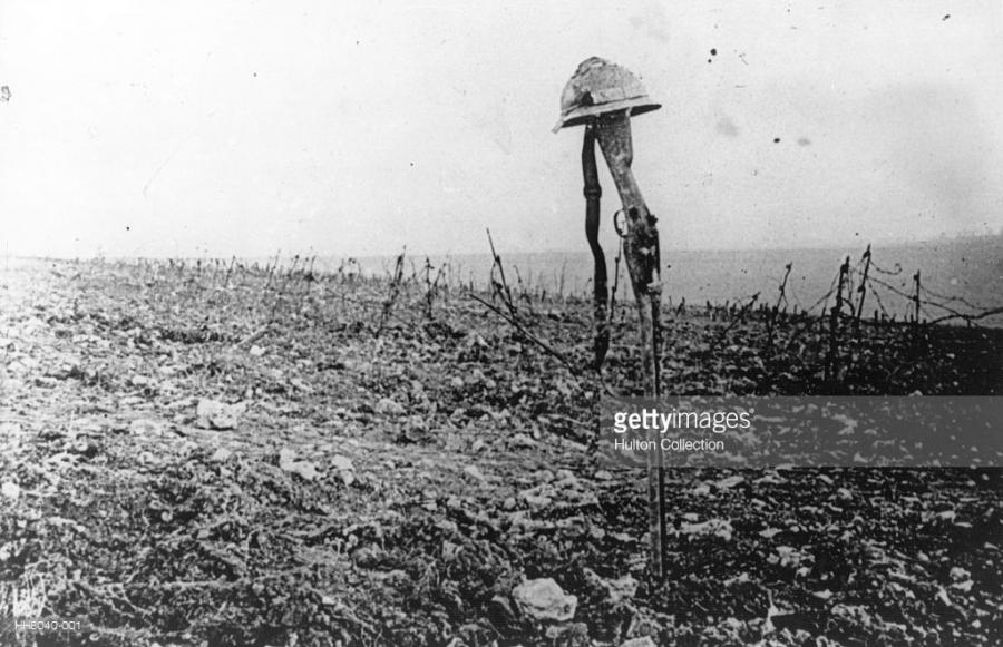 "Battlefield Grave A French soldier's grave, marked by his rifle and helmet, on the battlefield of Verdun."