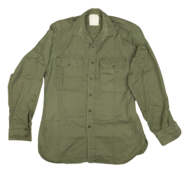 During the Vietnam War Australian troops wore shirts known as “jungle greens”. The cotton shirts were light olive in colour.