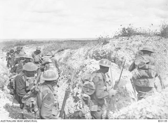 Men of the 6th Brigade move up for their final assault on Mont St Quentin, 1 September 1918. 