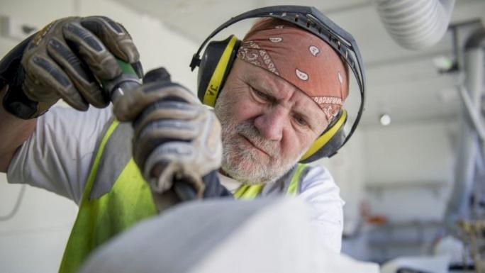 The Traditional Restoration Company working on a carving reconstruction