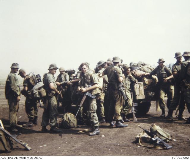 SOLDIERS OF 131 Divisional Locating Battery, waiting for helicopter transport to FSB Coral on 12 May 1968