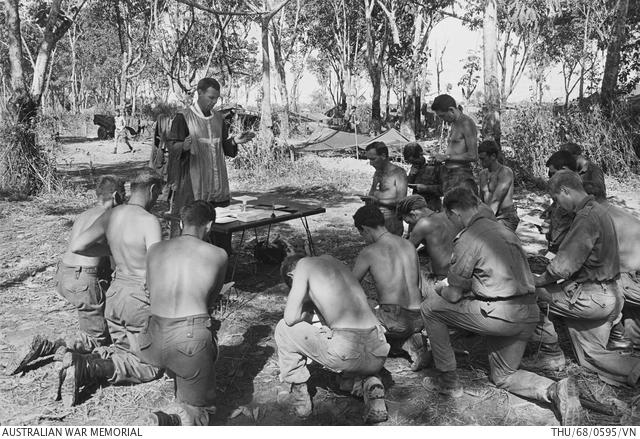 In June 1968, following three weeks of almost continuous enemy engagements around Fire Support Bases Coral and Balmoral, Catholic priest Father R.G. Widdison performs a field mass at FSB Coral to remember the 26 Australians who died and more than 100 wounded.