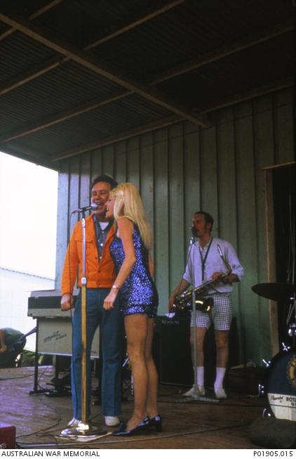 Entertainer Johnny O’Keefe and members of his 1969–70 touring party on stage at Nui Dat.