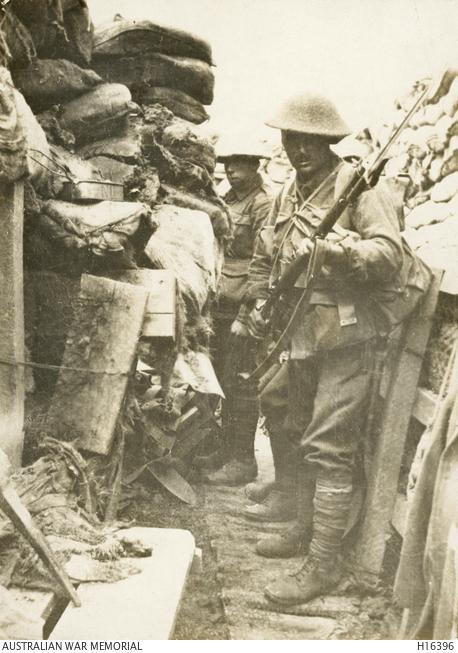 Men of the 53rd Battalion, 14th Brigade minutes before leaving the safety of their trench for the attack