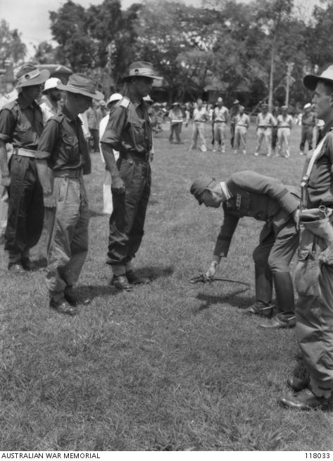 Lieutenant Colonel Murray Robson accepts the surrender of Major General Uno at Bandjermasin