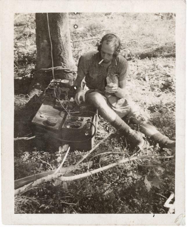 Corporal Ron Bell, the radio wizard and senior wireless electrical mechanic, preparing to signal Darwin.