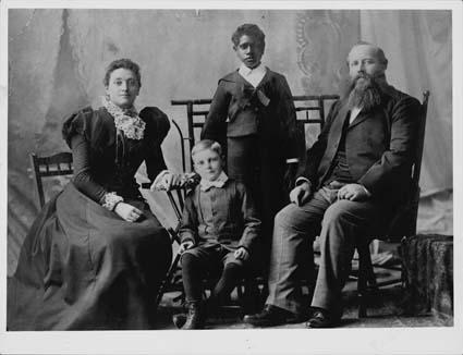 Portrait of Douglas Grant with his adoptive family