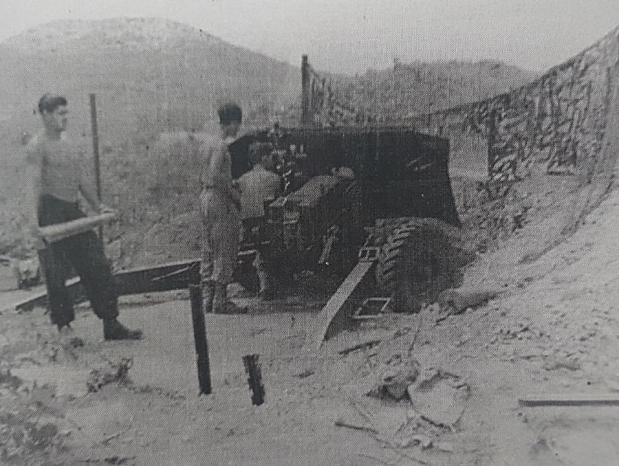 A 17-pounder anti-tank gun engaging enemy positions. 