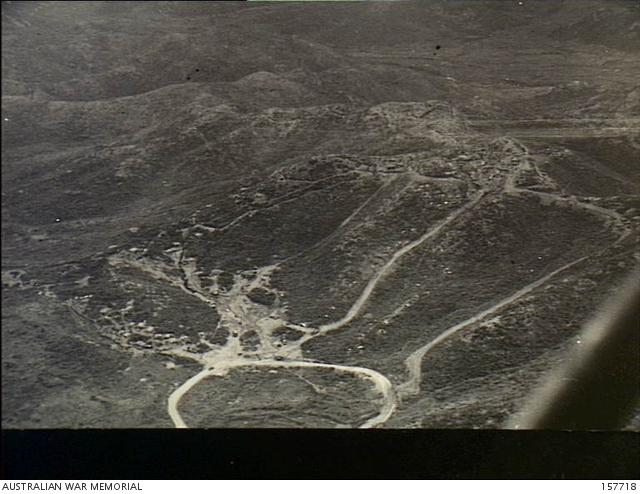 Majon'ni, Korea. 1953-07-27. Aerial view of The Hook defences showing the trenching and supply routes of D Company, 2nd Battalion, The Royal Australian Regiment (2RAR), on the mountain slopes.