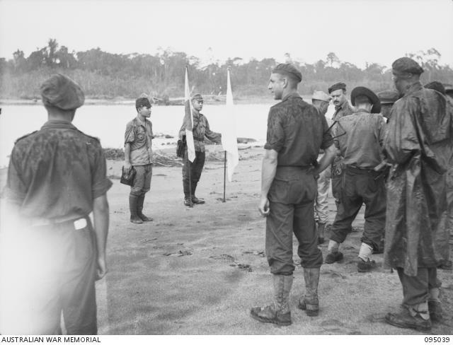 First contact between the Japanese surrender envoy and Australian faorces, Southern Bougainville, 18 August 1945. AWM 095039