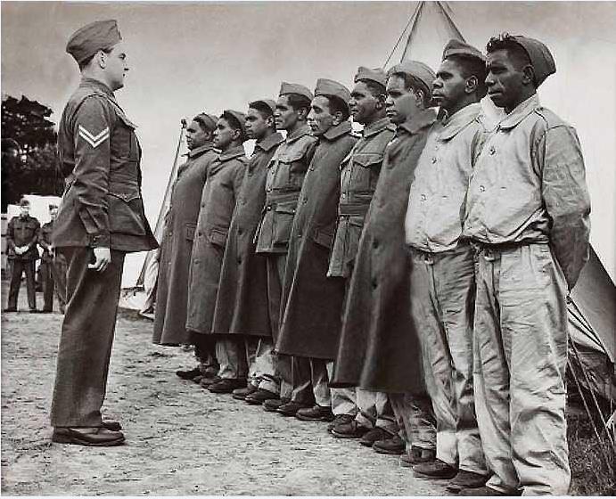 Aboriginal recruits from Lake Tyers lined up for morning parade at Caulfield after joining the 2nd AIF, c. 1940, State Library of Victoria H99.201/282.