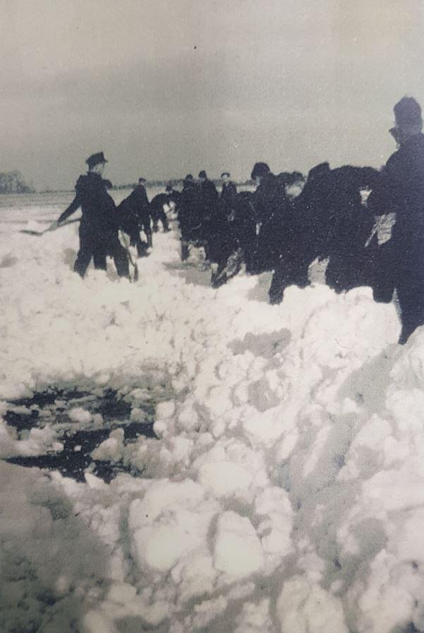 Clearing snow off the runway