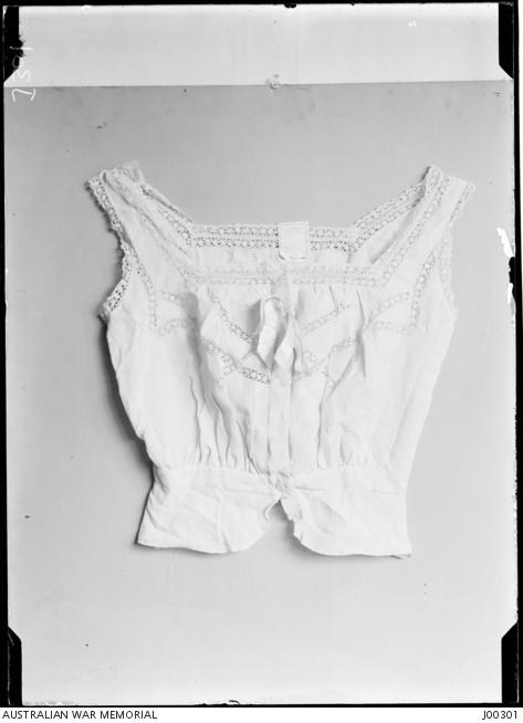 Woman's paper camisole made as substitute clothing and used in Germany during First World War. The paper used to make this camisol is known as Ersatz