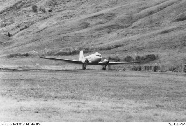 A Dakota of No. 10 (General Reconnaissance) Sqn, taking off from an airfield in PNG, 1952