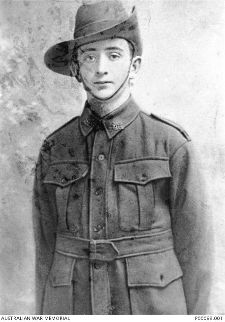 Studio portrait of 1553 Private (Pte) James (Jim) Martin, 1st Reinforcements, 21st Battalion, of Hawthorn, Vic.