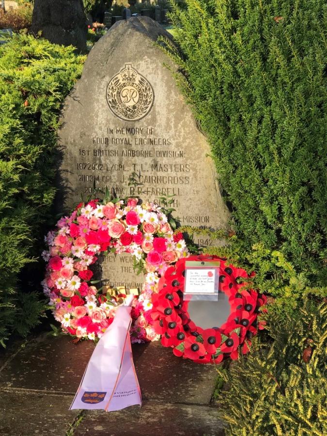 picture of gravesite with flowers